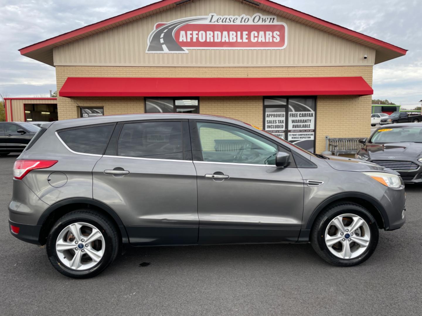 2013 Gray Ford Escape (1FMCU0GX1DU) with an 4-Cyl, EcoBoost, 1.6L engine, Auto, 6-Spd w/SelShft transmission, located at 8008 Warden Rd, Sherwood, AR, 72120, (501) 801-6100, 34.830078, -92.186684 - Photo#0